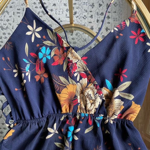 Floral Summer Romper with Ruffle bottom and Criss cross back - Picture 2 of 8